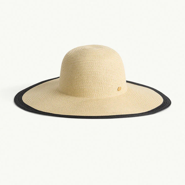 Beige sun hat with black trim on a white background