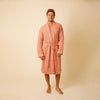 Man wearing Happy Place Weightless Waffle Robe in Terracotta