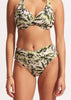 A high waist wrap bikini bottom with a leafy green print, matching the top, providing a full coverage.